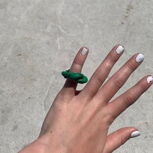 Green and black swirly thick ring